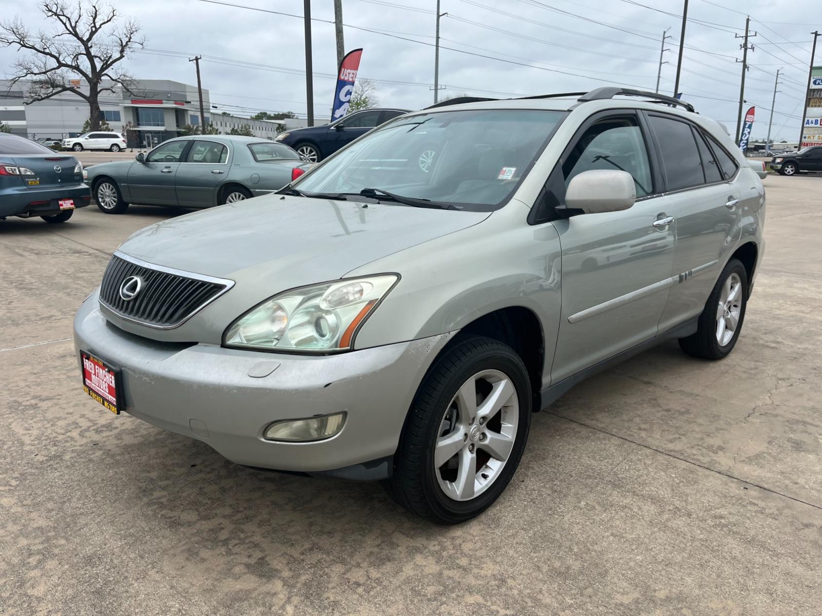 2004 SILVER /TAN Lexus RX 330 2WD (2T2GA31U44C) with an 3.3L V6 DOHC 24V engine, 5-Speed Automatic Overdrive transmission, located at 14700 Tomball Parkway 249, Houston, TX, 77086, (281) 444-2200, 29.928619, -95.504074 - Photo #2
